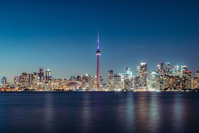 1-Hour Toronto Harbour Tour with Live Narration - Rogers Centre from the water: stadium geometry at eye level