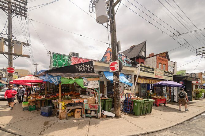 Kensington Market and Chinatown: A Self-Guided Tour - Chinatown street-life: herbs, produce mounds, and dried seafood