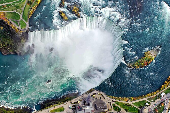 Niagara Falls Day Tour from Toronto Includes Boat Tour and Winery - The Falls Experience: Hornblower Cruise in Summer, Journey Behind in Winter