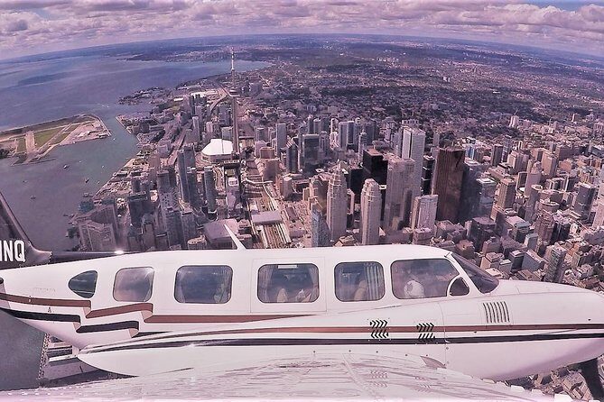 One hour Aerial Tour of Toronto and Niagara Falls with iflyTOTO - Toronto at 2,500 Feet: CN Tower and Rogers Centre in One Pass