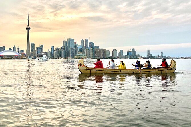 Sunset Canoe Tour of the Toronto Islands - Boarding a Voyageur canoe: life jackets, teamwork, and real coaching