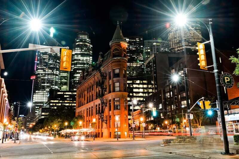 Toronto: Small Group Night Tour with Harbour Boat Cruise - Distillery District at your pace: cobblestones and small places